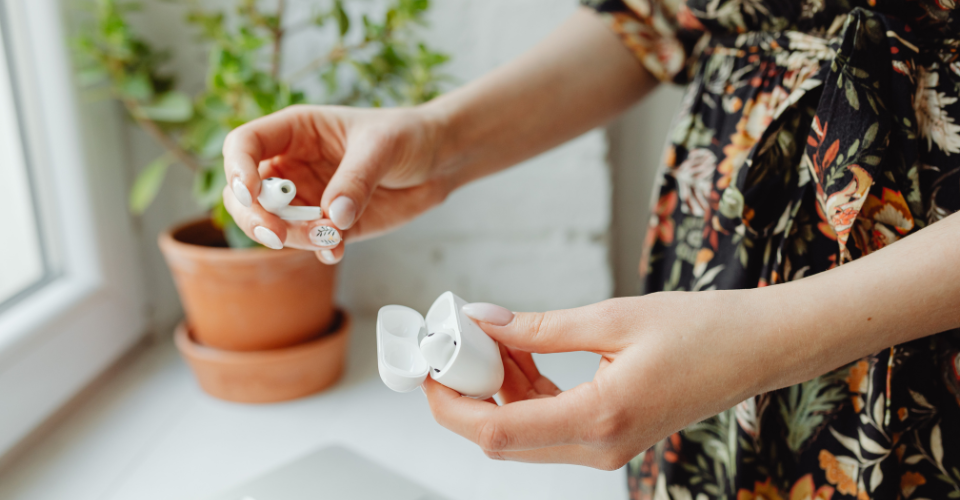 how to put on AirPods with long nails